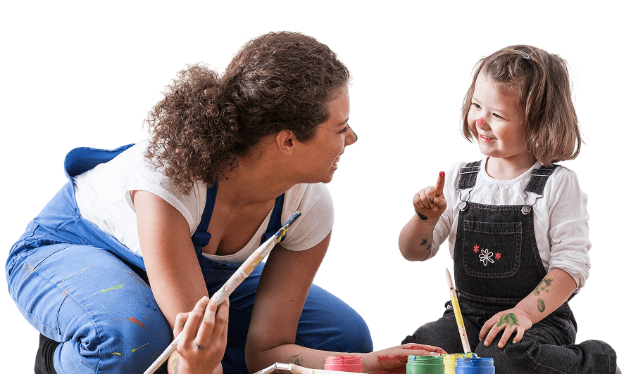 An adult and a child, both in overalls, smile and paint together with colorful paints and brushes. The child, part of a Preschool Program, holds up one finger with paint-covered hands, embracing the joy of Early Childhood Education.